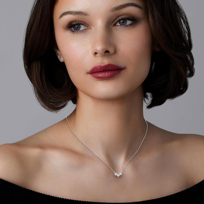 Diamond three stone necklace in sterling silver,